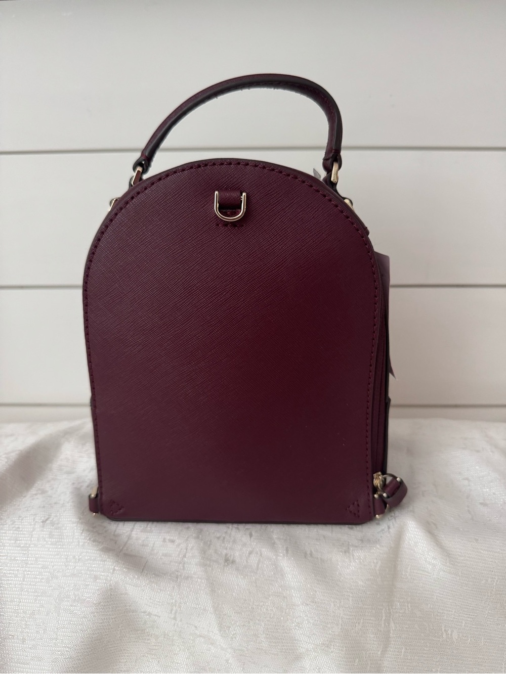 Kate Spade Cameron Mini Convertible Leather Backpack in the color cherrywood - Picture 5 of 11